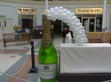 CHAMPAGNE BOTTLE WITH SPILLING BUBBLES (click to enlarge)