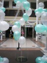 EIGHT BALLOONS SPIRALING AROUND A TABLE MIRROR (click to enlarge)